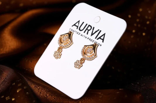 [Metal Type] [Product Type] [Key Feature] - AURVIA
Example: "Rose gold dangle earrings crystal details - AURVIA" (54 chars)
