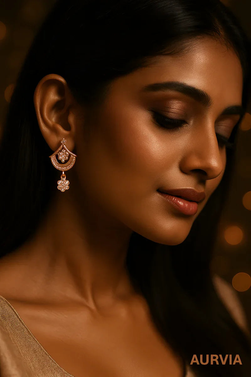 Model wearing rose gold dangle earrings elegant jewelry - AURVIA
